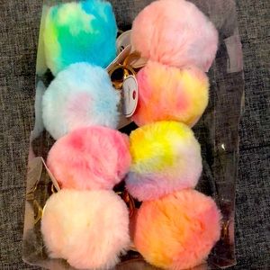 Multi color pompon key chains soft fabric, dozen for 15.00.
